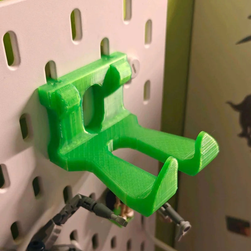 Soporte de pared para mando de videojuegos para tablero perforado