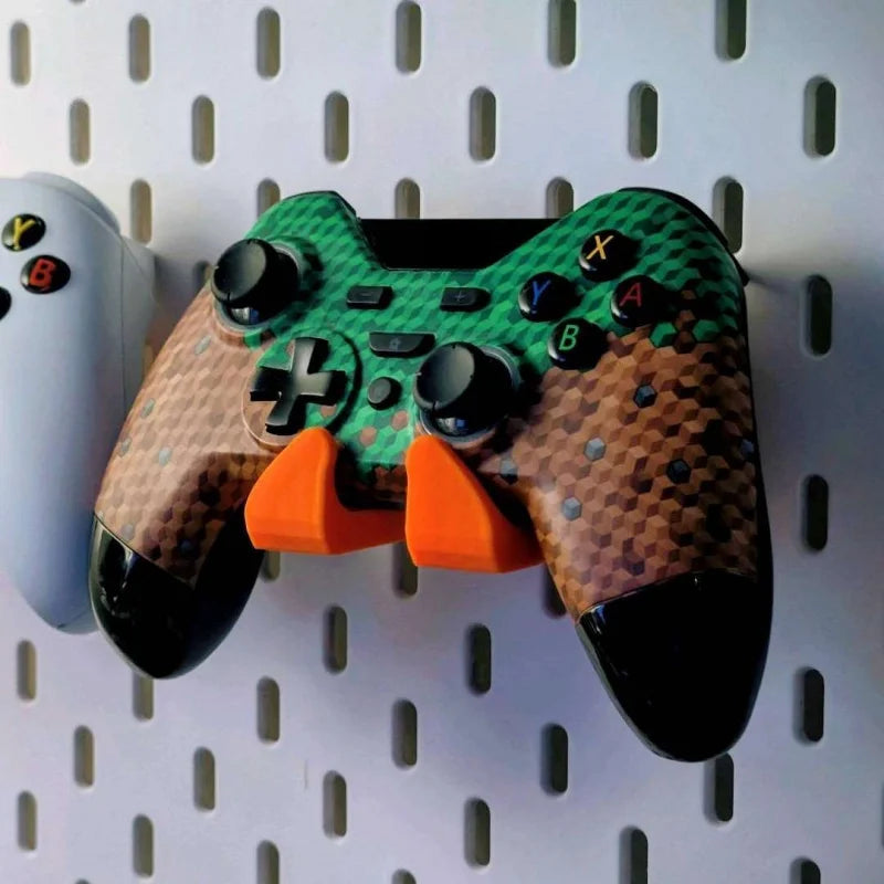 Soporte de pared para mando de videojuegos para tablero perforado